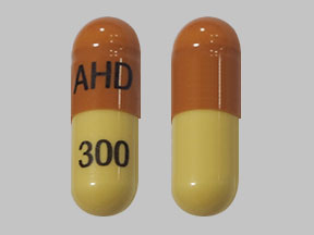 Gabapentin 300 mg Strides Shasun, AHD 300 Pill - brown & yellow capsule/oblong, 19mm